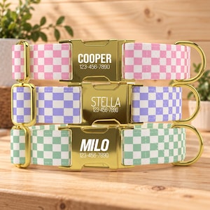 May include: Three pet collars with gold-tone metal buckles and hardware. Each collar features a checkered pattern in pink, purple, or green. The buckles are engraved with the names COOPER, STELLA, or MILO and the phone number 123-456-7890.