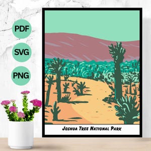 May include: A framed art print depicting a stylized landscape of Joshua Tree National Park. The artwork shows a desert scene with Joshua trees, a winding path, and a mountain range. The colour palette includes shades of green, orange, and purple.