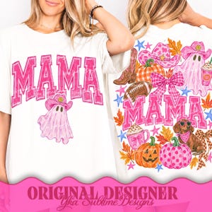 May include: A white t-shirt featuring a pink graphic on the front that says MAMA with a ghost wearing a cowboy hat. The back graphic includes the word MAMA, a ghost in a cowboy hat, pumpkins, a football, a dachshund, and pink plaid bows.