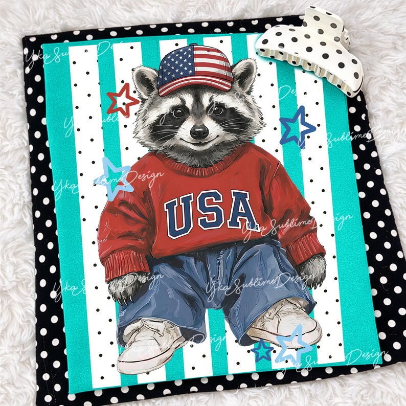 May include: A patriotic raccoon illustration wearing a red sweater with "USA" in white letters, blue jeans, and a baseball cap with an American flag design. The background features a teal and white striped pattern with star accents.