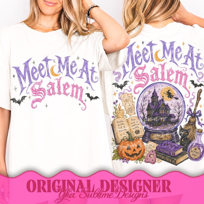 May include: A white t-shirt featuring a purple and pink graphic that reads Meet Me At Salem. The design includes a crescent moon, bats, a crystal ball with a haunted house, a jack-o'-lantern, an open spellbook, a broom, and a potion bottle.