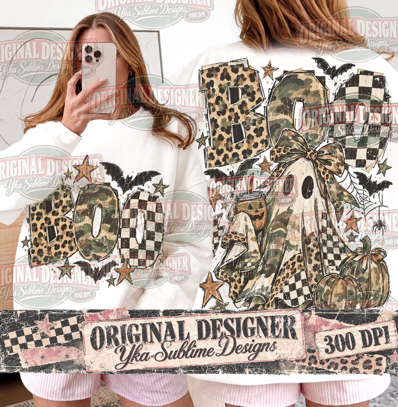 May include: A white sweatshirt featuring a graphic print of the word BOO in leopard, camouflage, and checkered patterns. The design includes a ghost wearing a bow, a pumpkin, bats, stars, and spiderwebs. The text Original Designer Yka Sublime Designs 300 DPI is visible.