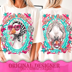 May include: Cream-colored t-shirt featuring a cartoon goose wearing heart-shaped sunglasses and a checkered scarf. The front says "Guess What?" and the back says "Silly Butt!" with disco balls and cherry accents.