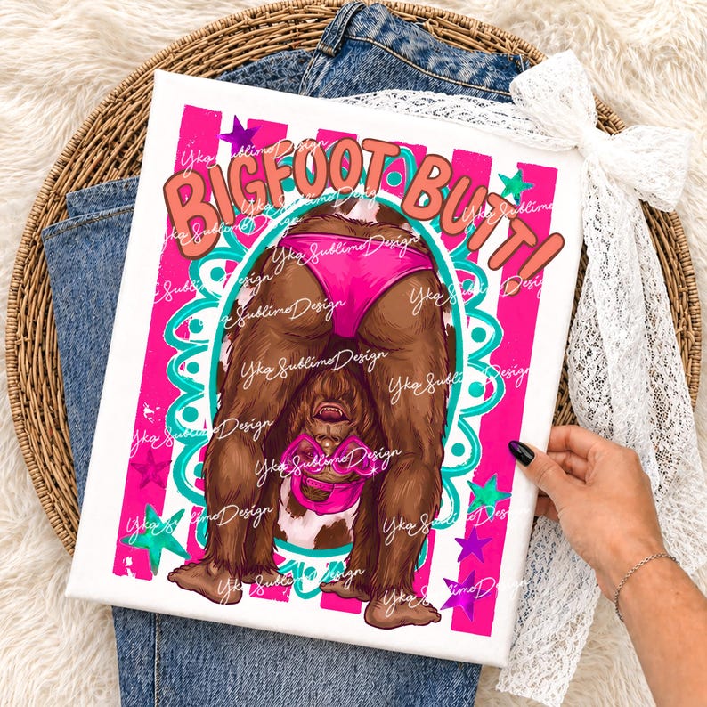 May include: A canvas print featuring a cartoon illustration of Bigfoot's backside in pink underwear. The words "BIGFOOT BUTT!" are in orange and pink. The background has pink and white stripes with teal and purple accents.