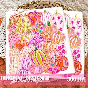 May include: A white fabric surface featuring a repeating pattern of pumpkins in various shades of pink, orange, and green. The pumpkins are decorated with diverse motifs including stripes, polka dots, stars, and floral patterns in bright colors.