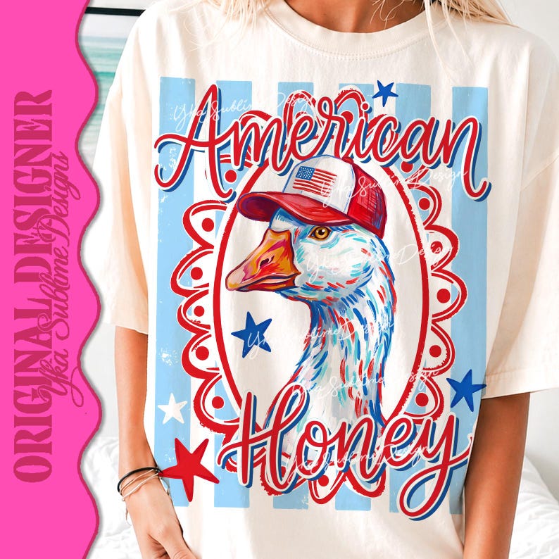 May include: Cream-colored t-shirt featuring a patriotic design. The graphic includes a goose wearing a red, white, and blue hat, with the words "American Honey" in a script font. The background has red and blue stripes and stars.