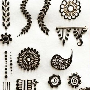 May include: A collection of henna tattoo designs in black ink on a white background. The designs include floral patterns, paisley shapes, and leaf-like motifs. The image showcases various intricate henna art elements.