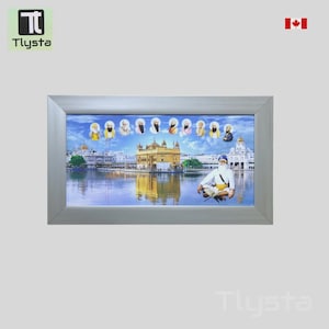 May include: Framed print featuring a detailed depiction of a golden temple reflected in water, with figures and architectural elements. The artwork is set within a silver frame, showcasing a serene and spiritual scene.