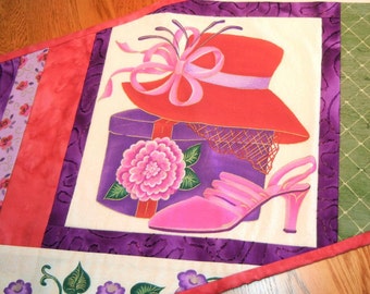 Red hat and pink high heels table runner