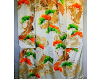 Ivory white uchikake embroidered in cranes and pine trees (a very formal kimono)