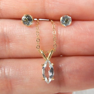 14 kt gold and aquamarine earring and necklace set - the birthstone for March