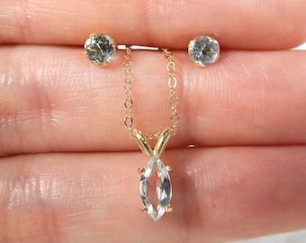 14 kt gold and aquamarine earring and necklace set - the birthstone for March