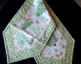 Cheerful light green trees winter table runner - reversible