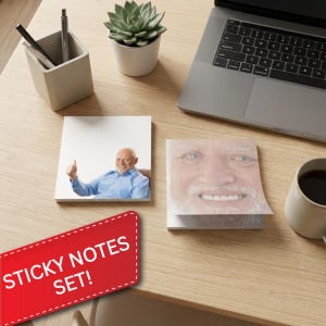 May include: A set of sticky notes featuring the face of a smiling older man. One pad shows the man giving a thumbs up. The other pad shows a close-up of his face. The set includes a red label that says "STICKY NOTES SET!"