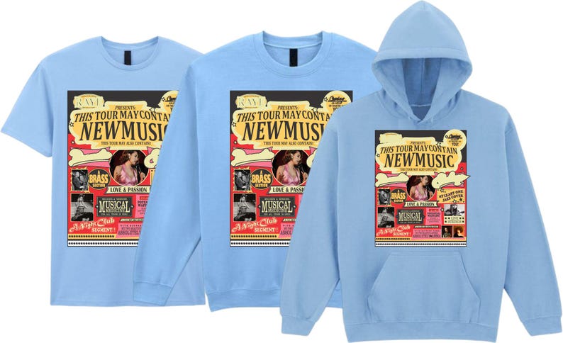 May include: Light blue t-shirts and a hoodie featuring a colorful graphic. The graphic reads "THIS TOUR MAY CONTAIN NEW MUSIC" with images of musicians and the words "BRASS" and "MUSICAL".
