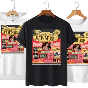 May include: Three garments: a white hoodie, a black t-shirt, and a white sweatshirt. Each features a concert poster design with the text "RAYE PRESENTS THIS TOUR MAY CONTAIN NEW MUSIC". The design includes images and text.