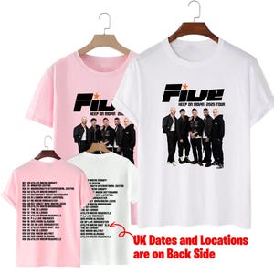 May include: Pink and white t-shirts featuring the band "Five". The front of the shirts display the band's name and a group photo. The back of the shirts list UK tour dates and locations. The shirts are hanging on wooden hangers.