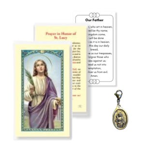 May include: A collection of religious items, including prayer cards and a charm. The prayer cards feature text and an image of a saint. The charm is a small, gold-colored oval with a saint's image.