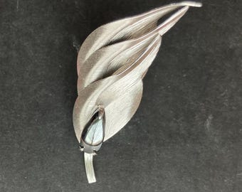 Midcentury Silver-Tone Brushed Metal Leaf Brooch with Hematite Accent, Unsigned