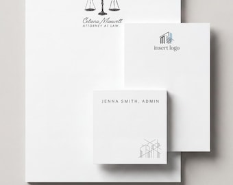 May include: A stack of white stationery including a letterhead with a black scale of justice icon and the text Celiena Maxwell Attorney at Law, a note card with a blue and grey logo, and a square note pad with the text JENNA SMITH, ADMIN.