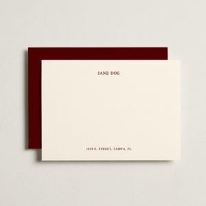 Custom burgundy flat note cards with matching envelopes displayed in a clean neutral flat lay, elegant personalized stationery set featuring modern correspondence cards, monogram thank you note set, luxury paper goods gift, wedding thank you stationery, professional writing cards, sophisticated folded note cards with envelopes, rich wine red stationery aesthetic, premium personalized correspondence set, high end desk paper accessories, custom gift for her, timeless minimalist stationery mockup
