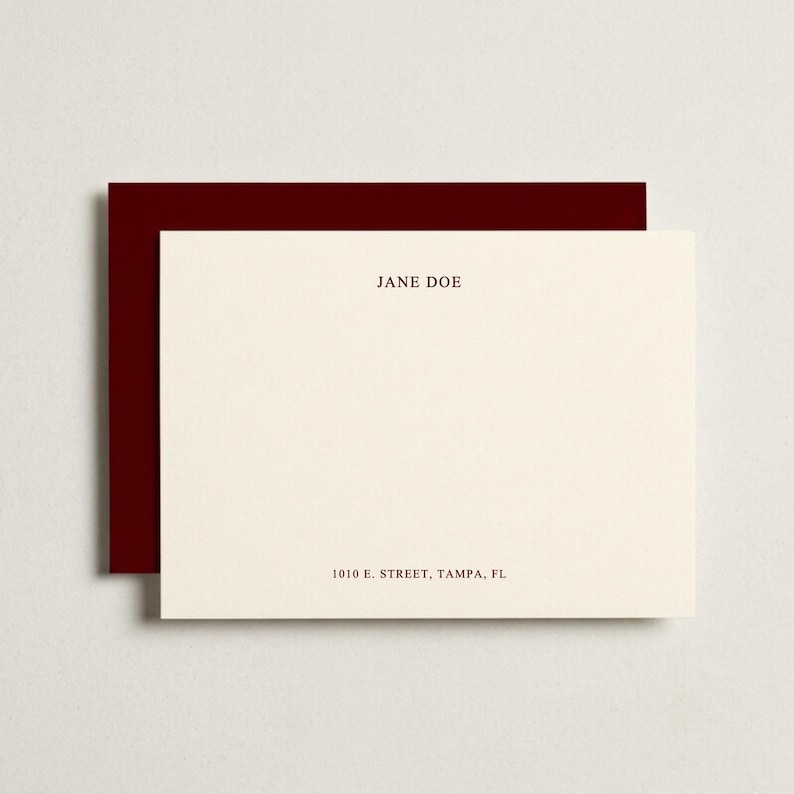 Custom burgundy flat note cards with matching envelopes displayed in a clean neutral flat lay, elegant personalized stationery set featuring modern correspondence cards, monogram thank you note set, luxury paper goods gift, wedding thank you stationery, professional writing cards, sophisticated folded note cards with envelopes, rich wine red stationery aesthetic, premium personalized correspondence set, high end desk paper accessories, custom gift for her, timeless minimalist stationery mockup