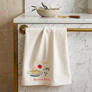 Personalized kitchen tea towel hanging on luxury cabinet handle, custom embroidered towel gift, elegant housewarming present, bridal shower kitchen decor, hostess gift idea, cottage style linen towel, neutral farmhouse hand towel, realtor closing gift, wedding shower keepsake. Perfect for newlyweds, home chefs, apartment gifts, custom home accents, holiday hosting, thoughtful kitchen accessories, premium cotton towel decor, and elevated everyday home styling.