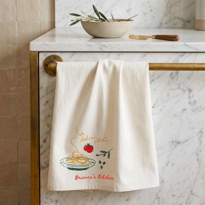 Personalized kitchen tea towel hanging on luxury cabinet handle, custom embroidered towel gift, elegant housewarming present, bridal shower kitchen decor, hostess gift idea, cottage style linen towel, neutral farmhouse hand towel, realtor closing gift, wedding shower keepsake. Perfect for newlyweds, home chefs, apartment gifts, custom home accents, holiday hosting, thoughtful kitchen accessories, premium cotton towel decor, and elevated everyday home styling.