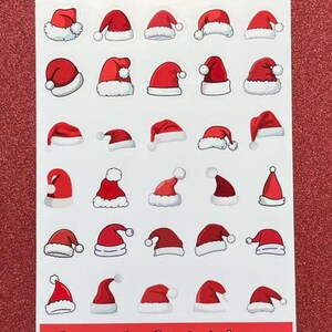 May include: A sticker sheet titled Tiny Santa Hats featuring thirty individual red and white Santa hat illustrations in various angles and styles, with the text Party Loft Stickers printed in white on a red banner at the bottom of the sheet.