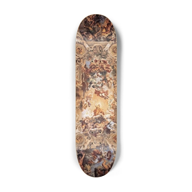 May include: A skateboard deck featuring a detailed Renaissance-style painting with figures, clouds, and architectural elements in shades of brown, beige, and gold. The deck has a standard shape and is designed for skateboarding.