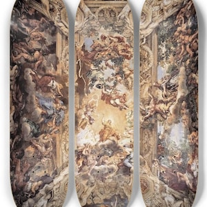 May include: Three skateboards with a Renaissance-style painting design. The artwork features figures, clouds, and architectural elements in shades of brown, beige, and blue. Each board has a curved shape with pre-drilled holes for trucks.