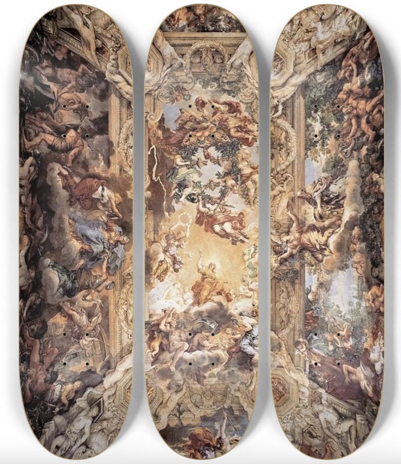 May include: Three skateboards with a Renaissance-style painting design. The artwork features figures, clouds, and architectural elements in shades of brown, beige, and blue. Each board has a curved shape with pre-drilled holes for trucks.