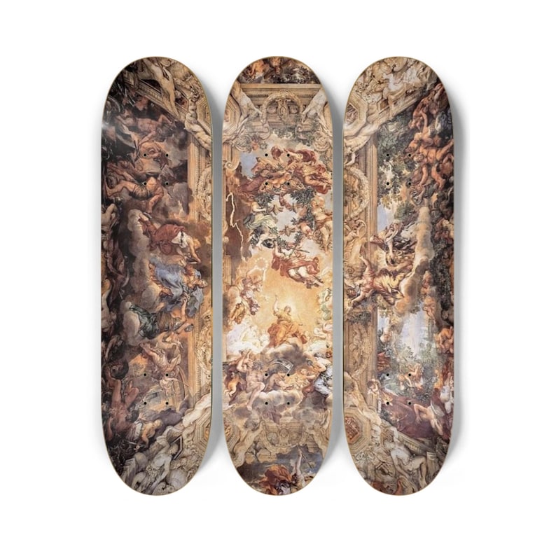 May include: Three skateboards with a Renaissance-style painting design. The artwork features figures, clouds, and architectural elements in shades of brown, beige, and blue. The skateboards are arranged vertically against a white background.