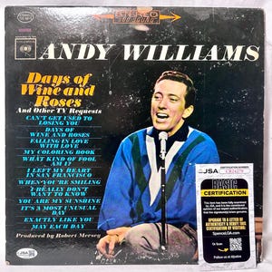 May include: A vintage vinyl record album cover featuring Andy Williams. The cover displays the title Days of Wine and Roses and Other TV Requests, a tracklist, and a photograph of the artist in a blue sweater singing into a microphone.