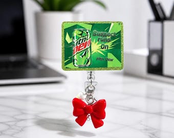 Funny Energy Drink Inspired Badge Reel | “Suspect Runs on Soda” Retractable ID Badge Holder | Cute Nurse, Teacher & Office Gift