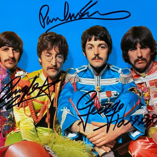 Fotografía de The Beatles firmada por Paul McCartney, Ringo Starr y George Harrison, con certificado de autenticidad.