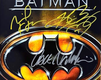 Gesigneerde foto van Michael Keaton, Jack Nicholson en Kim Basinger als Batman, inclusief echtheidscertificaat.