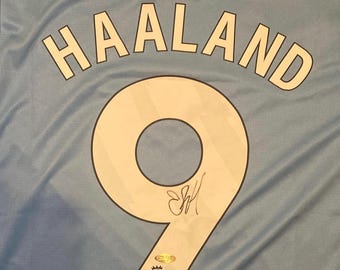 Erling Haaland signeerde Man City #9-trui met COA
