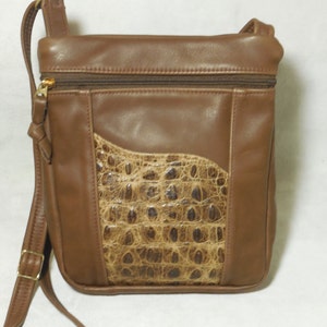 Women&#39;s brown leather shoulder, or cross-body bag with croco accent pocket