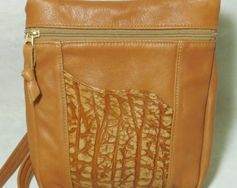 Camel colored leather shoulder bag, cross-body bag, with embossed leather accent front pocket