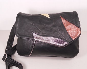 black leather bag divider style with metalics