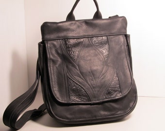 black cowhide convertable bag, messenger bag, cross-body bag, backpack