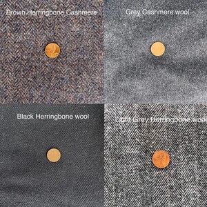 May include: Four fabric swatches with a US penny coin on each. The swatches are brown herringbone cashmere, grey cashmere wool, black herringbone wool, and light grey herringbone wool.
