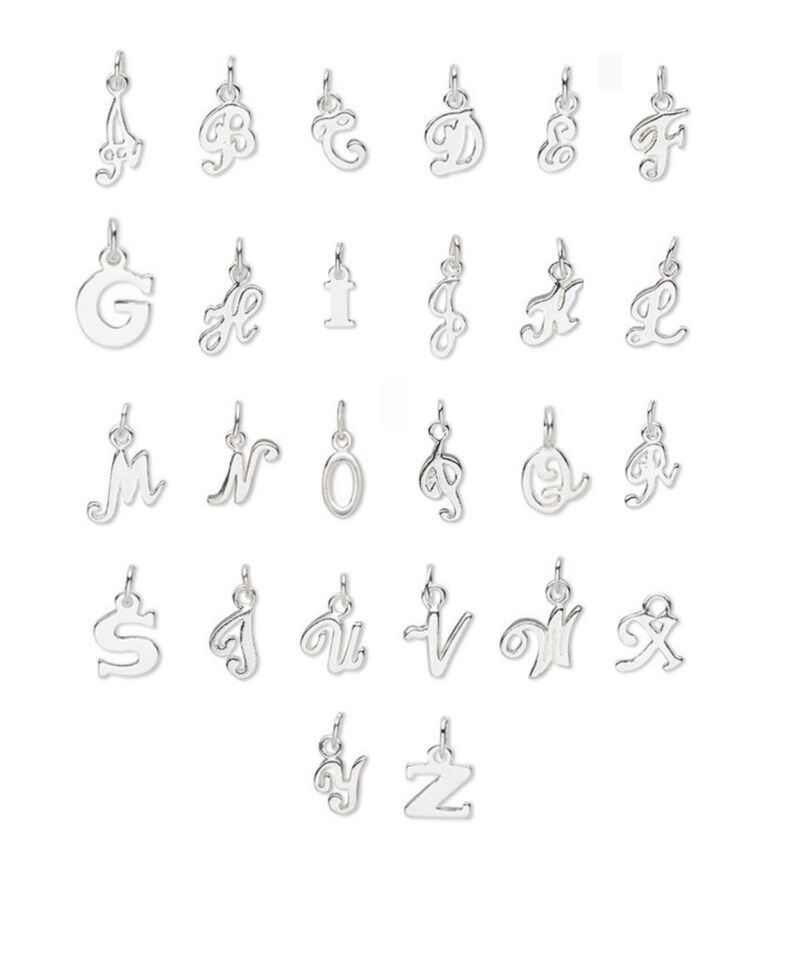 May include: A set of 26 silver charm pendants, each featuring a different letter of the alphabet in a cursive script style.