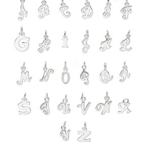 May include: A set of 26 silver charm pendants, each featuring a different letter of the alphabet in a cursive script style.