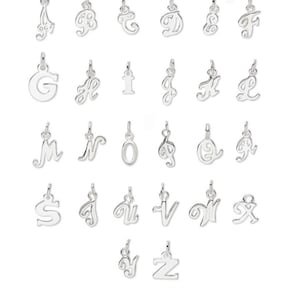 May include: A set of 26 silver charm pendants, each featuring a different letter of the alphabet in a cursive script style.