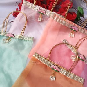 May include: A set of three ceramic mugs with a speckled, matte finish. The mugs are in shades of cream, light gray, and dark gray. Each mug has a simple, minimalist design, perfect for coffee or tea.