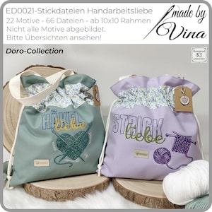 May include: Two drawstring bags, one sage green and one lavender, sit on wooden rounds. The green bag says "HÄKEL liebe" with a yarn heart design. The lavender bag says "STRICK liebe" with a knitting needle design. Both have floral trim.