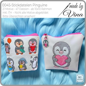 May include: Two white zippered pouches with pink trim, featuring embroidered penguin designs. One pouch has multiple penguins with various accessories, while the other has a single penguin holding a heart. The text "0045-Stickdateien Pinguine" is visible.