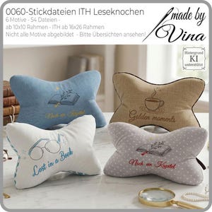 May include: Four decorative reading pillows in various colors and designs. One is light blue with an embroidered book and the text "Nach ein Kapitel". Another is tan with a coffee cup and the text "Golden moments". A white pillow has glasses and the text "Lost in a Book". The last is gray with white polka dots, an embroidered book, and the text "Nach ein Kapitel".